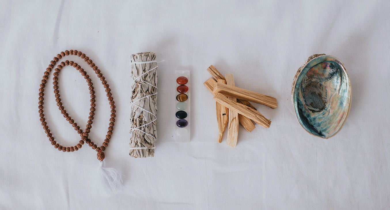 A shot of our Rudrashka, Sage stick, Stones, Palo Santo and Paua collection
